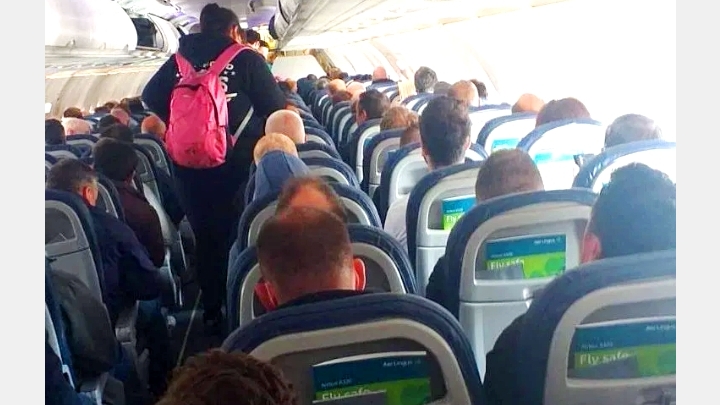 Lottery for life. Will You agree to move in such a crowded plane at this COVID-19 time?